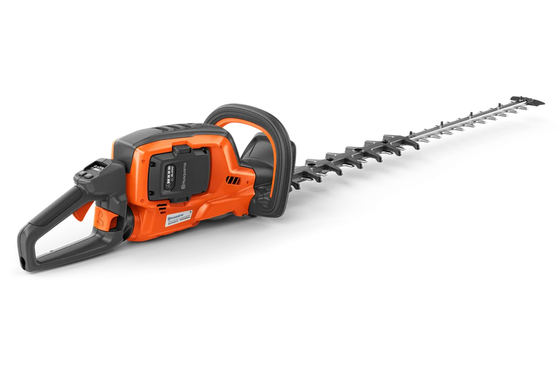 This image features the Husqvarna 522iHD75 Battery Hedge Trimmer - Skin only, showcasing its orange and grey design. Equipped with a long, serrated blade, this trimmer has a black handle and trigger, making it ideal for cutting and shaping hedges and shrubs in gardens with cordless manoeuvrability.
