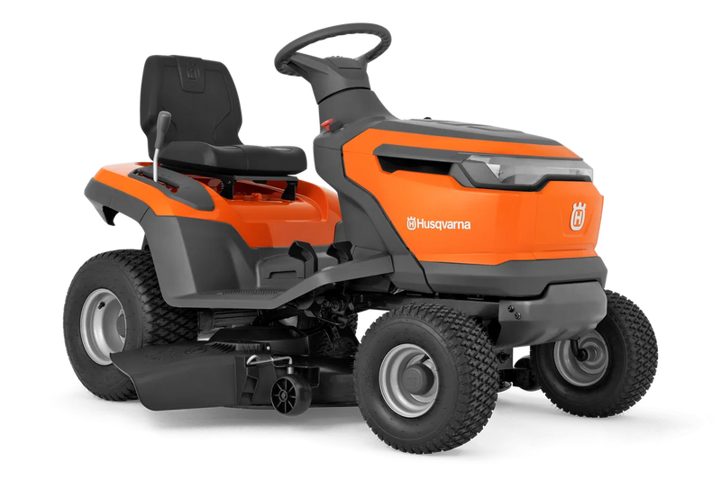 The Husqvarna Battery TS 100i Tractor, in orange with a black seat and steering wheel, offers ergonomic comfort and features robust wheels with visible blade housing. The brand logo is prominently displayed on the side, ensuring efficient mowing with every use.