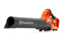 The Husqvarna 230iB Leaf Blower skin, featuring a brushless motor for enhanced efficiency, showcases a sleek orange design with black and gray accents. The "Husqvarna" name is proudly displayed on the tube, and its ergonomic handle ensures comfortable operation.