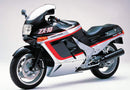 The Ventura EVO-12 Bike-Pack Kit for the Kawasaki ZX-10 1000 features a sleek black pack with striking orange detailing and includes the versatile Evo-Rack for easy mounting. It also offers a generic image of an L-bracket with screws, ensuring secure attachment to your Sport-Rack system.