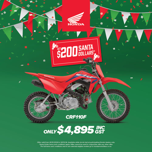 The Honda CRF110F dirt bike by Honda is displayed in a side profile view, showcasing its red body with blue and white accents. It comes with knobby tires, a black seat, and a compact design equipped with Keihin electronic fuel injection and clutch-less transmission, making it ideal for off-road riding.