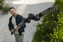 The Husqvarna Aspire™ Shrub Shear 18V (Skin) is a sleek, modern black and orange battery-operated hedge trimmer with an 18V POWER FOR ALL ALLIANCE system. It includes a detachable blade and interchangeable Shrub Shear attachment, displayed on a plain white background.