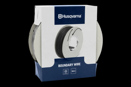 A Husqvarna Automower® Boundary Wire with a cardboard holder, akin to boundary wire installation for a Husqvarna Automower®. The boundary wire is neatly wound around the core, ready for installation. The holder features a cutout revealing the wire inside and two small threads sticking out, indicating the cable's end.