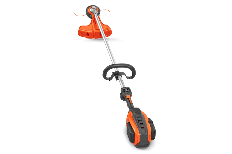 Image of an orange and black Husqvarna 525iLXT Battery Grass Trimmer (skin) perfect for gardens. The trimmer features a long straight shaft with a cutting head at one end and a battery pack at the other. There is a circular handle midway along the shaft for better grip and control, reminiscent of Husqvarna's ergonomic design.