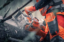 A side view of an orange Husqvarna 592 XP-28404® Chainsaw with "Husqvarna" written on the silver blade. The chainsaw features a black handle and various controls and components. The background is plain and white, highlighting the details of this essential forestry tool.