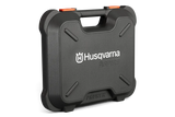 The Husqvarna Aspire™ Pruner Case is a black, hard plastic carrying case adorned with the Husqvarna logo and "ASPIRE" printed in white on the front. Reminiscent of rugged motorbike gear, it includes an ergonomic handle and an orange latch on top, with "PRUNER" embossed at the bottom.