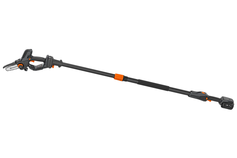 A black and orange, battery-powered telescopic pole saw with a small chainsaw attachment on the end, ideal for outdoor trimming tasks. The set includes a durable Husqvarna battery pack and a separate battery charger, all neatly arranged on a plain, white background. Perfect for maintaining lawns and gardens.