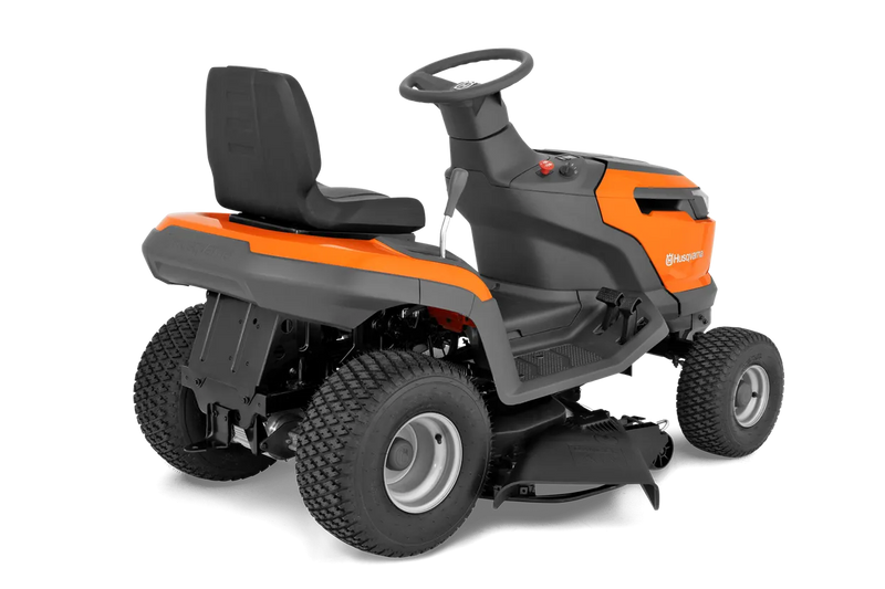 The Husqvarna Battery TS 100i Tractor, in orange with a black seat and steering wheel, offers ergonomic comfort and features robust wheels with visible blade housing. The brand logo is prominently displayed on the side, ensuring efficient mowing with every use.