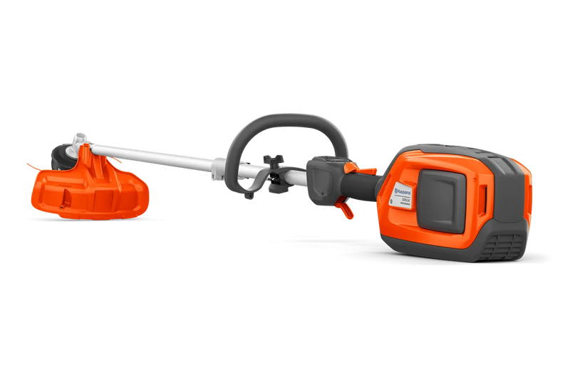An orange and grey Husqvarna 525iLK Combi Trimmer (skin) with a long handle, a looped grip, and a protective cover on the cutting end. Ideal for maintaining gardens and lawns, this powerful trimmer features a battery pack at the back for cordless operation.