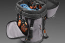 A versatile gray Husqvarna Gear backpack 70L with multiple pockets and orange accents, prominently displaying the Husqvarna logo on the front. A small green first aid symbol is near the bottom, making it ideal for climbing gear. The bag is set against a black background.