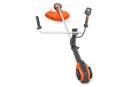 A professional-grade Husqvarna 525iRXT Brushcutter (skin) in orange and silver, featuring a long straight shaft and a protective guard over the cutting blade. The dual handles at the mid-section ensure optimal control, while the powerful motor unit is mounted at the bottom, perfect for forestry tasks.