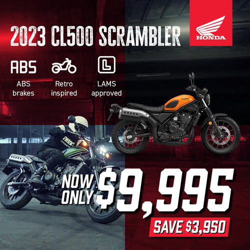 Experience the thrill of the orange 2023 Honda CL500 SCRAMBLER, boasting a 500cc twin-cylinder engine and scrambler styling. Equipped with ABS for safety, it's priced at $12,345. Save $1,600 in our limited-stock garage sale promotion!.