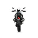 The AKRAPOVIC Slip On Muffler for the BMW R1300GS features a titanium body with dual carbon-fiber tips, easy attachment via its mounting bracket, and performance optimized on Akrapovič's dyno.