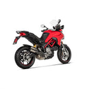 The AKRAPOVIC Slip On Multistrada 950/V2 features a Grand Prix-inspired dual carbon fiber exhaust system with two cylindrical titanium end pipes and a metal mounting bracket, all set against a white background.