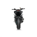 The Full System MT-09/FZ-09 2024 by AKRAPOVIC features a carbon-fiber muffler with the brand's logo, boasting a sleek black cylindrical design and four metallic pipes, delivering a sporty racing sound.