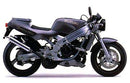 Image showing the Ventura EVO-12 Bike-Pack Kit for the Suzuki TV 200 Wolf (88-90), with an EVO-12 Pack (black bike bag), Evo-Rack metal rack, and L-Bracket with screws, labeled as a generic image.