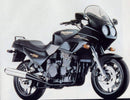 Ventura EVO-12 Bike-Pack Kit for Triumph Sprint 900 S,T,V,W (95-97): includes a black bike pack, an Adjustable Pack-Rack metal rear rack, and black L-brackets with mounting hardware—all clearly labeled.