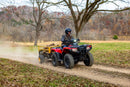 The Honda TRX700FA5 is a red and black all-terrain vehicle (ATV) built for off-road adventures. Featuring rugged tires and a sturdy build, it includes a four-wheel-drive system as well as front and rear cargo racks, blending sleek design with adventure-ready capability.