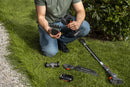 The Husqvarna Aspire™ Shrub Shear 18V (Skin) is a sleek, modern black and orange battery-operated hedge trimmer with an 18V POWER FOR ALL ALLIANCE system. It includes a detachable blade and interchangeable Shrub Shear attachment, displayed on a plain white background.
