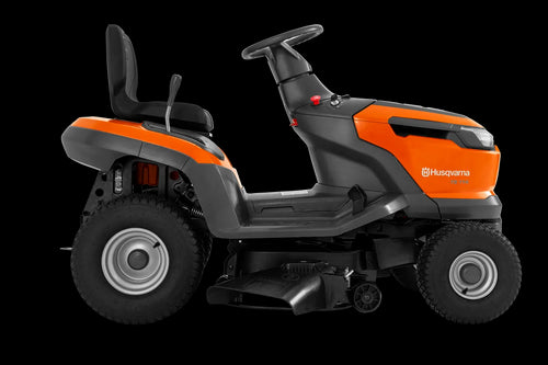 A bright orange Husqvarna TS 114 Lawn Tractor with black seating. This essential tool for maintaining beautiful lawns features large, sturdy wheels, a steering wheel, and various control mechanisms. The brand name and logo are prominently displayed on the front and side.