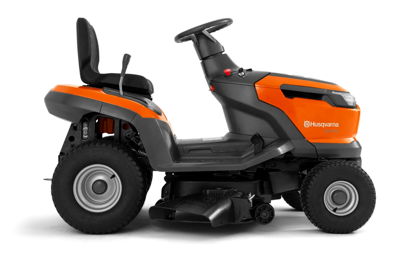 A bright orange Husqvarna TS 114 Lawn Tractor with black seating. This essential tool for maintaining beautiful lawns features large, sturdy wheels, a steering wheel, and various control mechanisms. The brand name and logo are prominently displayed on the front and side.