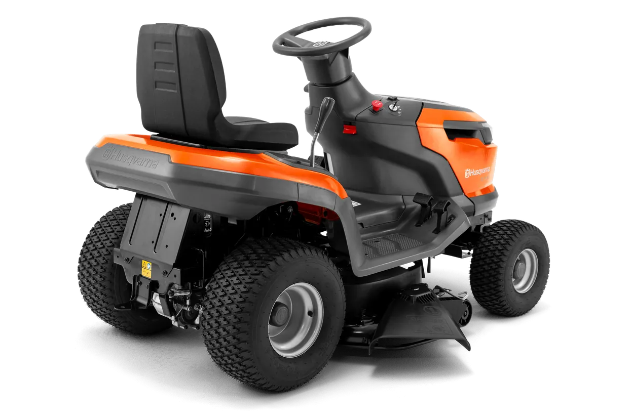 A bright orange Husqvarna TS 114 Lawn Tractor with black seating. This essential tool for maintaining beautiful lawns features large, sturdy wheels, a steering wheel, and various control mechanisms. The brand name and logo are prominently displayed on the front and side.