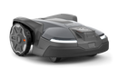 The Husqvarna Automower 430X NERA is a sleek, grey robotic lawn mower featuring two large wheels at the rear and two smaller wheels at the front. It boasts a red stop button on top, LED headlights, and proudly displays the Husqvarna logo on the front. With its modern design, this mower is equipped with object avoidance technology and can be conveniently controlled via the Automower Connect app.