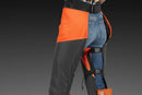 The Husqvarna Functional Safety Chaps, designed in bright orange and black for enhanced safety, feature durable fabric with reinforced areas. The high-visibility "Husqvarna" brand name is prominently displayed on the left thigh. These chaps offer an adjustable fit and boast a modern, rugged look ideal for outdoor work.