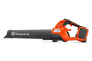 The Husqvarna 230iB Leaf Blower skin, featuring a brushless motor for enhanced efficiency, showcases a sleek orange design with black and gray accents. The "Husqvarna" name is proudly displayed on the tube, and its ergonomic handle ensures comfortable operation.