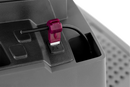 A close-up image of a red Husqvarna Automower® Connector terminal. The terminal, resembling an insulated female disconnect terminal, has a vinyl covering, and its gauge size, "22-16," is visible on the surface. The background is solid black, highlighting the terminal's details.
