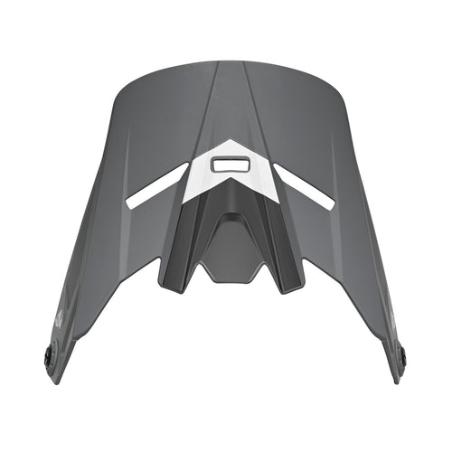 The THOR MX HELMET VISOR KIT S23Y SECTOR YOUTH CHEV GREY BLACK features a sleek, angular, aerodynamic design with dual front ventilation slits. Inspired by the iconic Thor MX style, this youth visor sports a white center accent and rounded side attachment points for secure helmet fitment. A perfect addition to any helmet visor kit.