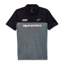 The Alpinestars Paddock Polo Black/Charcoal by Crown Kiwi Enterprises Limited features a stylish black top and gray bottom. It is accented with the "Alpinestars" branding in white and "Racing Ahead" in red, along with a small HD logo above the text for added flair. With its collar and white buttons, this polo is ideal for racing enthusiasts wanting to make a statement.