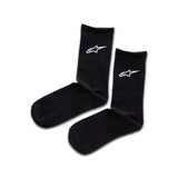 The Alpinestars Alpinestars Crew Socks by ALPINESTARS are crafted from a polyester and spandex blend, featuring a white logo with a stylized star and swirl design. They are black and conveniently machine washable for easy care.
