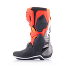 Colorful Alpinestars Tech-10 MX Boots by Crown Kiwi Enterprises Limited feature bold red, orange, white, black, and purple accents with prominent branding. These sleek boots include protective buckles, reinforced areas for durability and safety, and a Dynamic Heel Compression Protector.