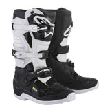 Alpinestars Stella Tech-3 MX Boots from Crown Kiwi Enterprises Limited are black and white with buckles, reinforced toes, and a unique logo on straps and shins. They offer impact protection, a women's fit, protective features, and a durable sole, ideal for off-road riding.