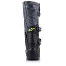 A pair of rugged, high-top black motocross boots with neon green accents. These Alpinestars Tech-5 MX Boots Black/Gray motorcycle accessories feature multiple buckles and straps for secure fastening, a reinforced toe, and a textured design with the ALPINESTARS logo prominently displayed on the front.