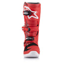 The Alpinestars Tech-7S MX Boots in bright red by Crown Kiwi Enterprises Limited are designed for youth riders, featuring black and white accents, sturdy buckles, reinforced padding for superior protection, a high-strength sole, and bold branding against a clean white background.