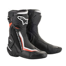 The Alpinestars S-MX Plus v2 Boots by Crown Kiwi Enterprises Limited feature a sleek black/white design. They offer reinforced ankle protection, textured soles for grip, and incorporate the Multi-Link Control (MLC) system for enhanced riding stability.
