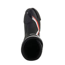 The Alpinestars S-MX Plus v2 Boots by Crown Kiwi Enterprises Limited feature a sleek black/white design. They offer reinforced ankle protection, textured soles for grip, and incorporate the Multi-Link Control (MLC) system for enhanced riding stability.