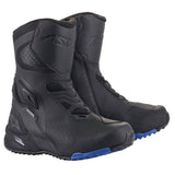 The Alpinestars RT-8 Gore-Tex Boots by Crown Kiwi Enterprises Limited are sleek black motorcycle boots with a high shaft and blue-accented soles. They include protective padding and the integrated Transversal Protection Frame for enhanced durability and touring confidence.