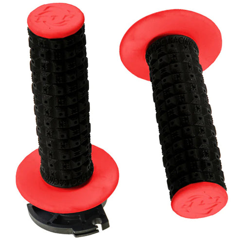 Two black and red DEFY MX LOCK ON GRIPS TORC 1 ENDURO BLACK RED by TORC1 RACING are shown. Each grip features a textured, black surface for slip-free performance, red flanges at the ends, and red end caps with a logo. One grip is positioned upright, while the other is laid flat, displaying the lock-on clamp crafted from CNC machined aluminum.