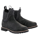 Introducing the Alpinestars Turnstone Shoes by ALPINESTARS: black leather Chelsea boots featuring a rugged sole, elastic side panels, and convenient front and back pull tabs. Crafted from durable bovine leather, these shoes offer a sturdy look ideal for any adventure.