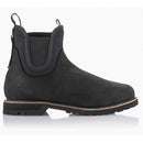 Introducing the Alpinestars Turnstone Shoes by ALPINESTARS: black leather Chelsea boots featuring a rugged sole, elastic side panels, and convenient front and back pull tabs. Crafted from durable bovine leather, these shoes offer a sturdy look ideal for any adventure.