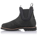 Introducing the Alpinestars Turnstone Shoes by ALPINESTARS: black leather Chelsea boots featuring a rugged sole, elastic side panels, and convenient front and back pull tabs. Crafted from durable bovine leather, these shoes offer a sturdy look ideal for any adventure.