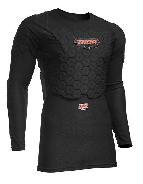The COMP XP FLEX DEFLECTOR LONG SLEEVE from THOR MX is a black base layer with a compression fit and long-sleeve construction. It provides padded protection for the chest and shoulders, featuring the "THOR" logo on the chest and the "CORE" emblem below. It is ideal for sports and safety enthusiasts.
