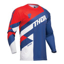 The THOR SECTOR CHECKER JERSEY YOUTH NV/RD by THOR MX is a long-sleeved motocross jersey made from moisture-wicking fabric. It displays striking red, blue, and white geometric patterns as part of the Sector Collection. Featuring prominent "THOR" branding on the chest and "SECTOR" on the lower side, it's perfect racewear for intense rides.