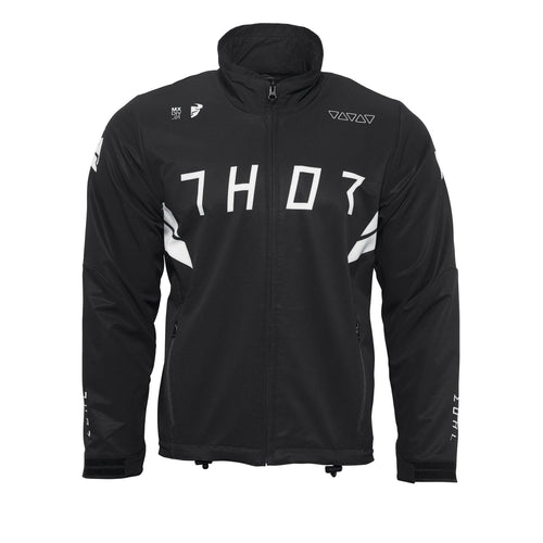 Introducing the THOR WARMUP JACKET BLACK/WHITE by THOR MX: This athletic black jacket features a zippered front, a high collar, and prominently displays the word “THOR” in bold white block letters across the chest. The sleeves boast white accents along with additional text. As part of the Warm Up collection, this jacket also includes practical front pockets and small logos near the collar and shoulders.
