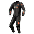 The Alpinestars GP Force Chaser Suit by Crown Kiwi Enterprises Limited is a leather motorcycle racing suit in black and orange with white accents, showcased against a white background. It offers Tech-Air® compatibility and includes Alpinestars GP protectors, featuring logos on the chest, sleeves, and legs, designed for safe riding.