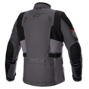 The Alpinestars Monteira Drystar XF Jacket by Crown Kiwi Enterprises Limited is a motorcycle jacket in gray and black with red accents, offering all-weather protection through its multiple pockets, adjustable straps, and zippers. Its design features reinforced panels and prominent branding on the chest and arm, making it ideal for adventure touring.