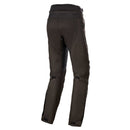 The Alpinestars Stella Gravity Drystar Pants, offered by Crown Kiwi Enterprises Limited, are shown on a white background. This pair of black motorcycle pants boasts CE certification, waterproof capabilities, reinforced knee areas, and multiple zippered pockets for enhanced durability and protection.